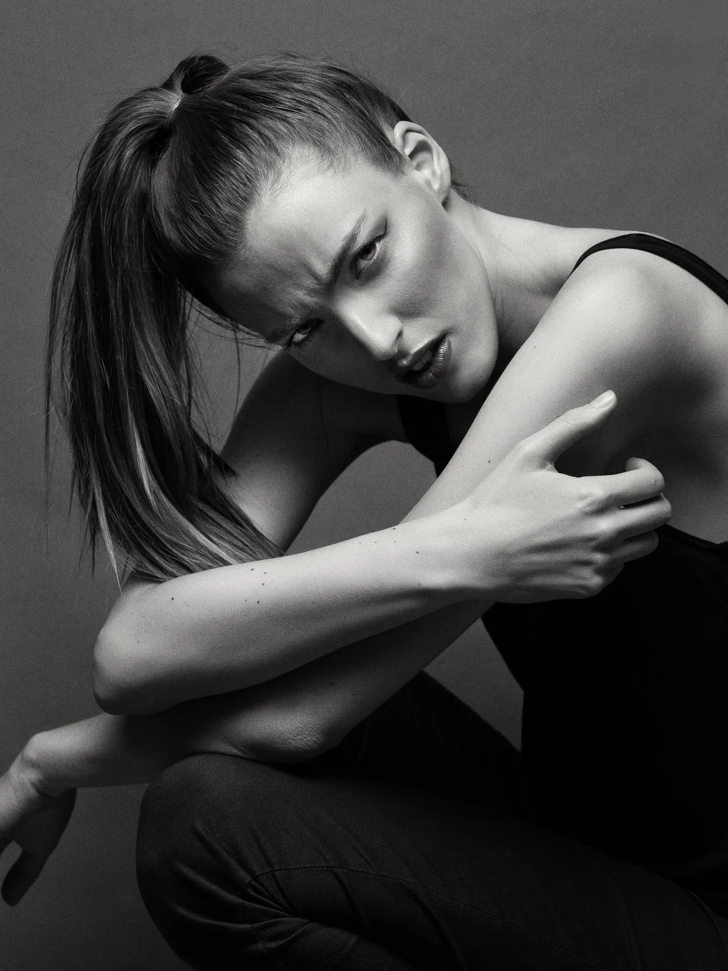 Fashion portrait black outfit dramatic pose - agency test