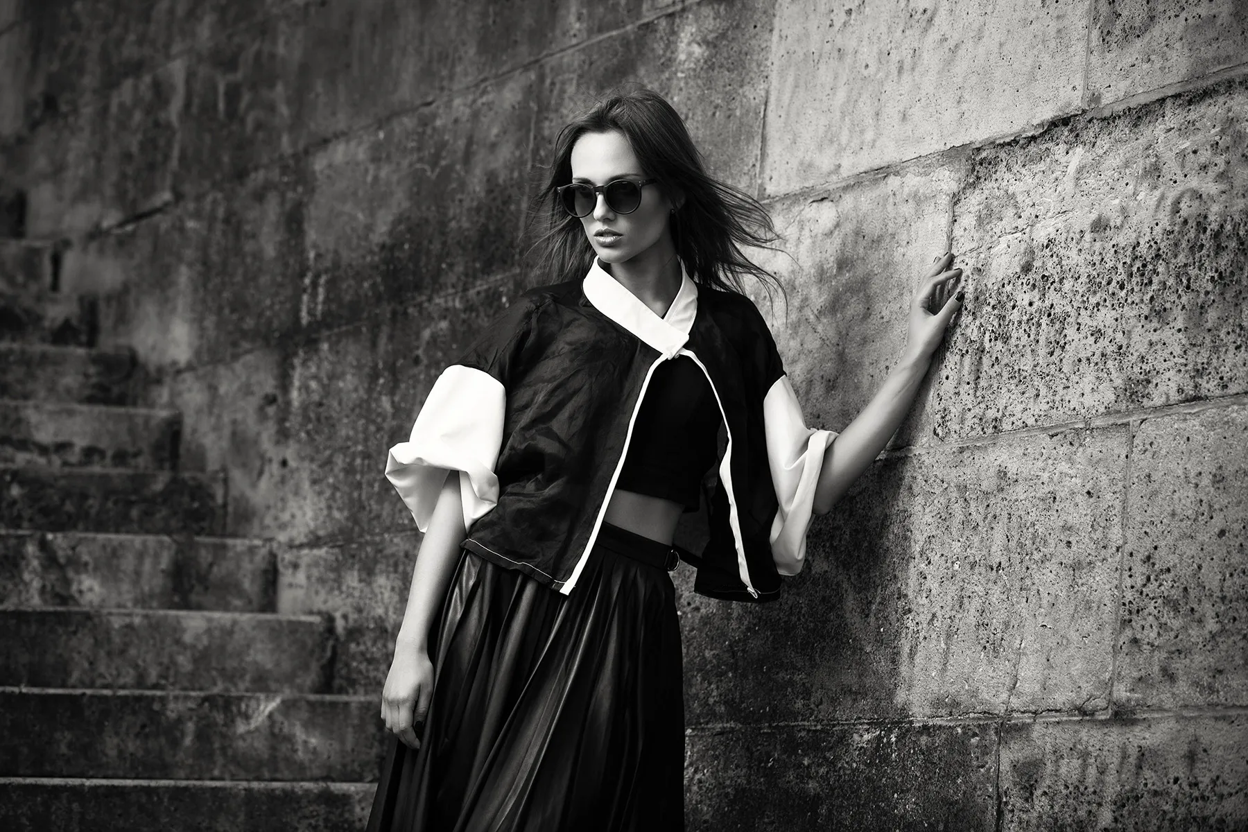 Fashion black dress wall sunglasses - editorial