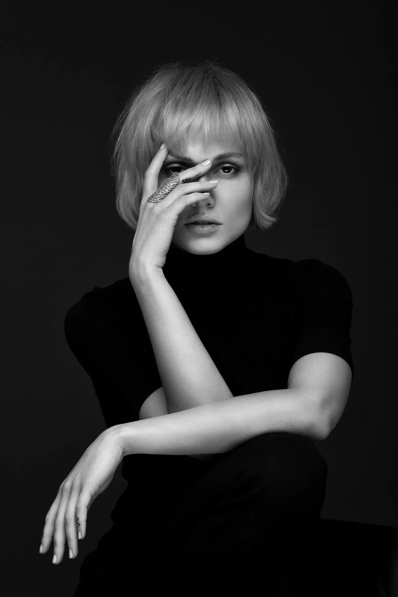 Dramatic portrait black turtleneck bw - editorial