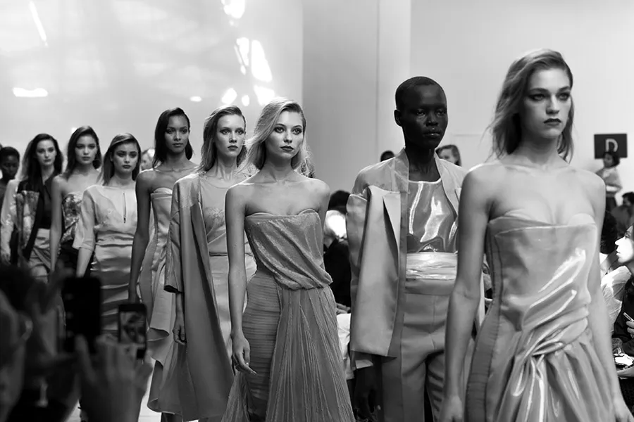 Runway models lineup backstage bw - fashion week 1