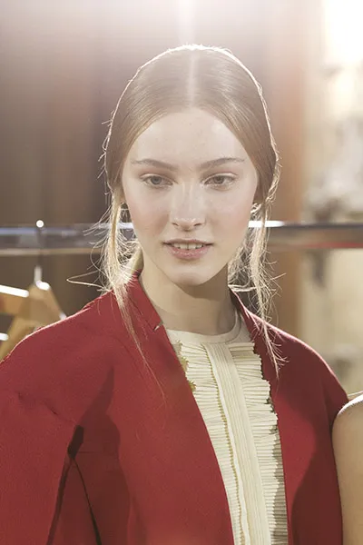 Model red jacket sunlight portrait - fashion week 1