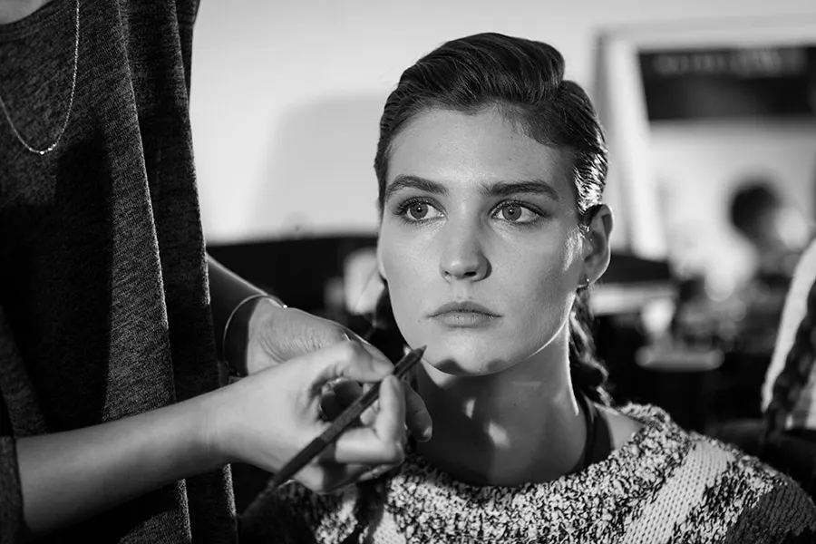 Model backstage jewelry closeup bw - fashion week 1